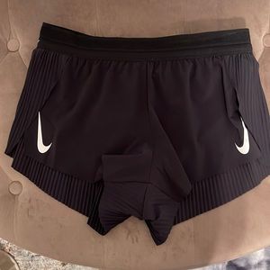 Nike Aeroswift shorts. Never worn. Took off tags to wash.